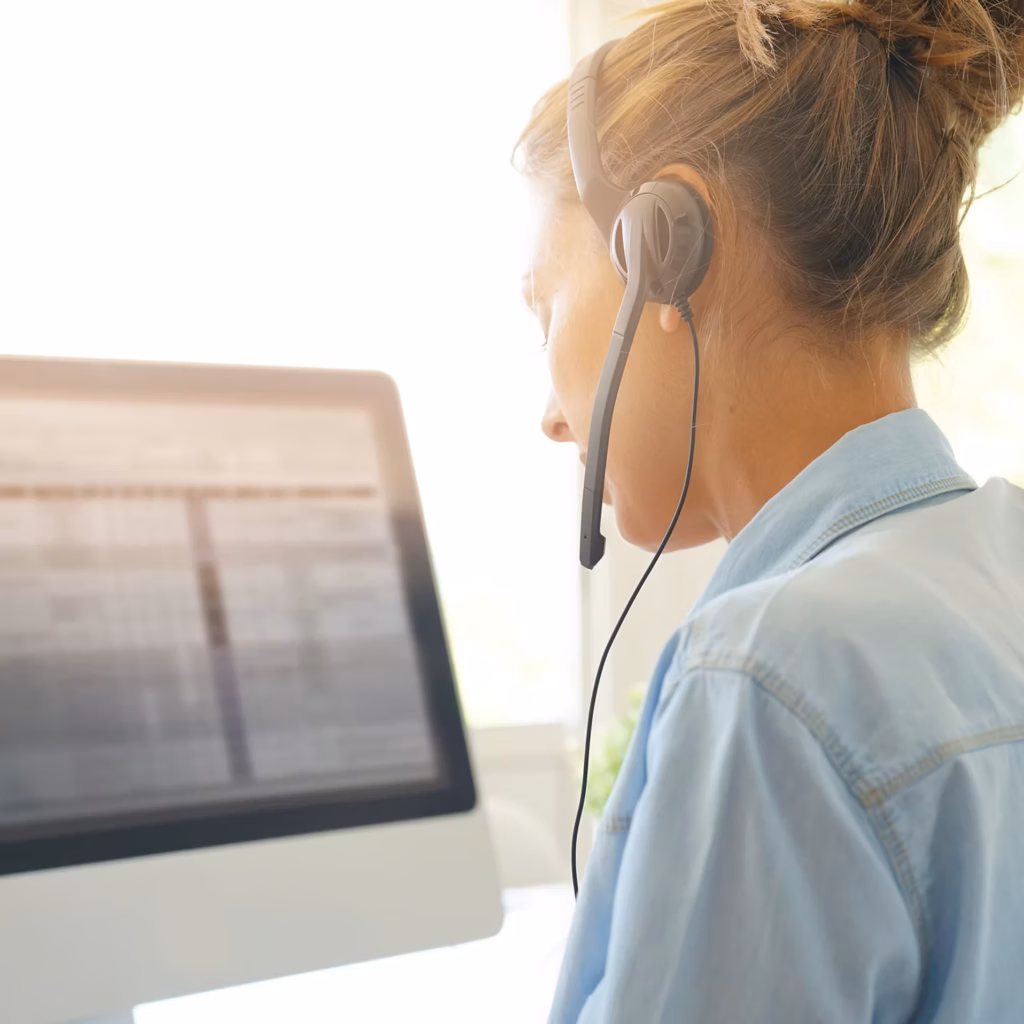 Female call centre agent on a headset